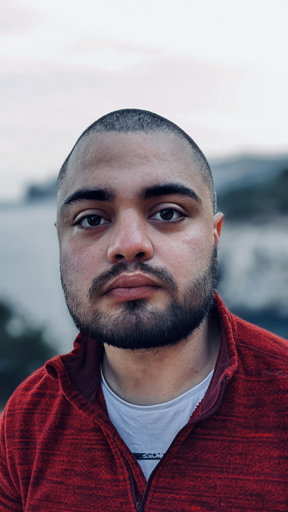 a close up of a person with a beard