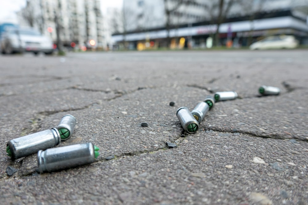 a bunch of bullet shells laying on the ground