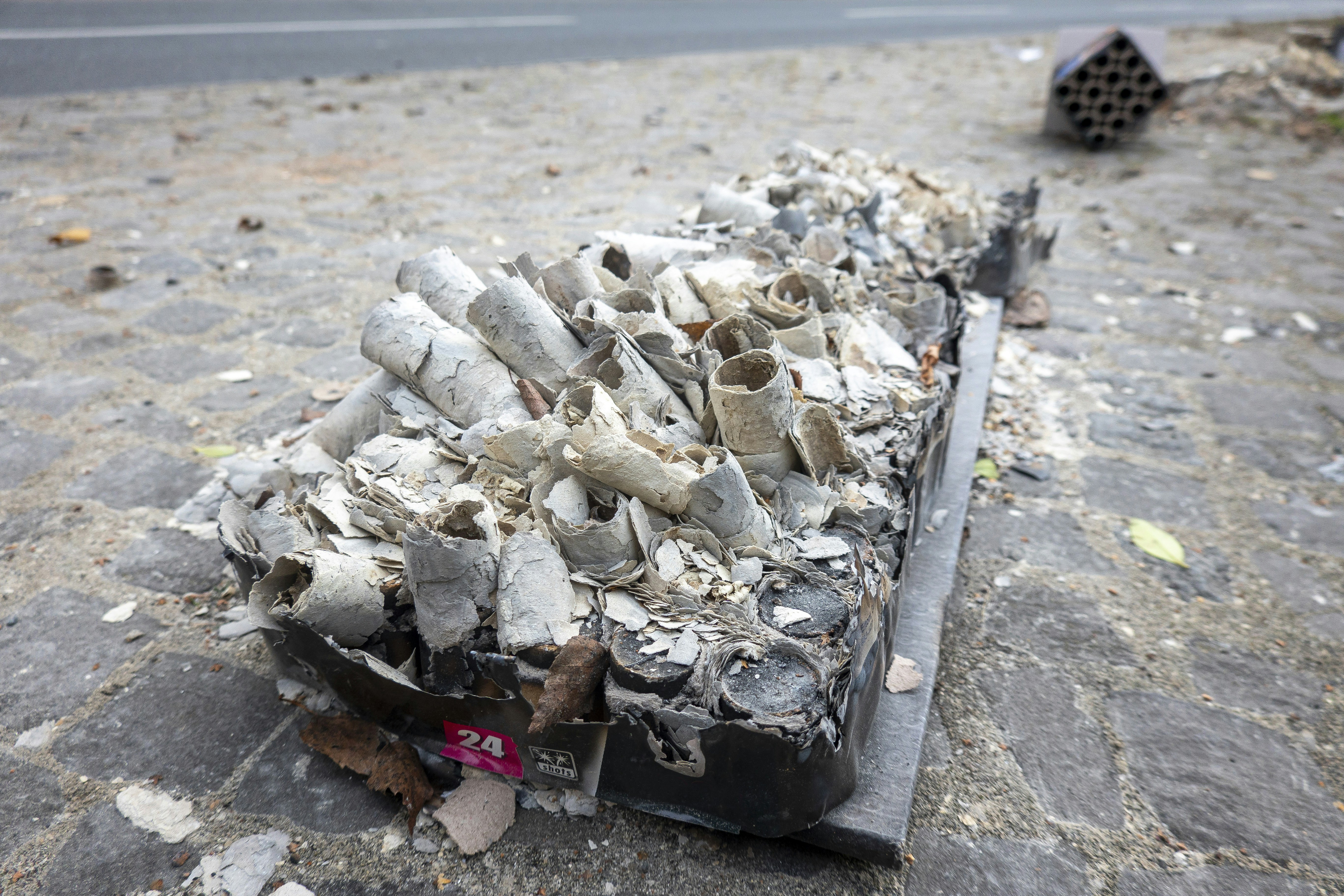 A pile of rubble sitting on the side of a road photo – Free Party Image ...