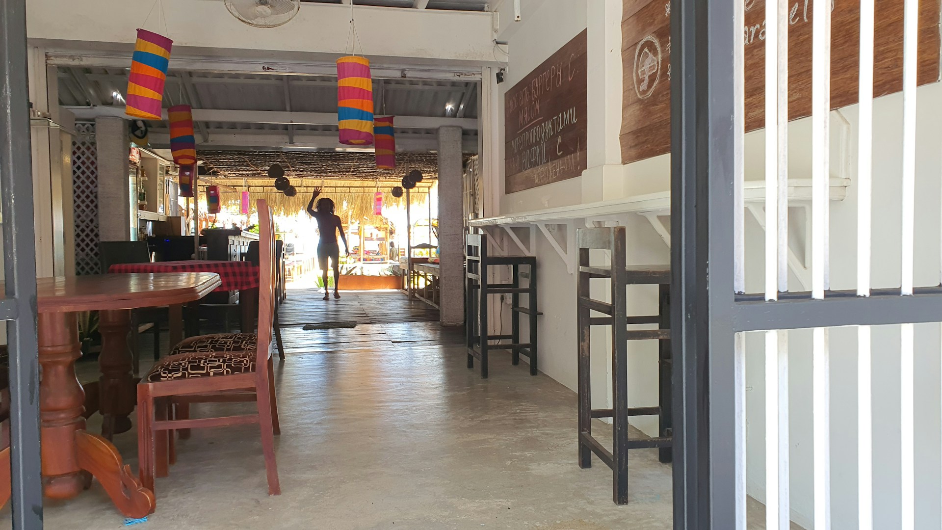 woman wearing yellow long-sleeved dress under white clouds and blue sky during daytime