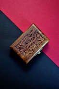 A beautifully engraved wooden gift box.