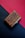 A close-up of a beautifully engraved wooden keepsake box.
