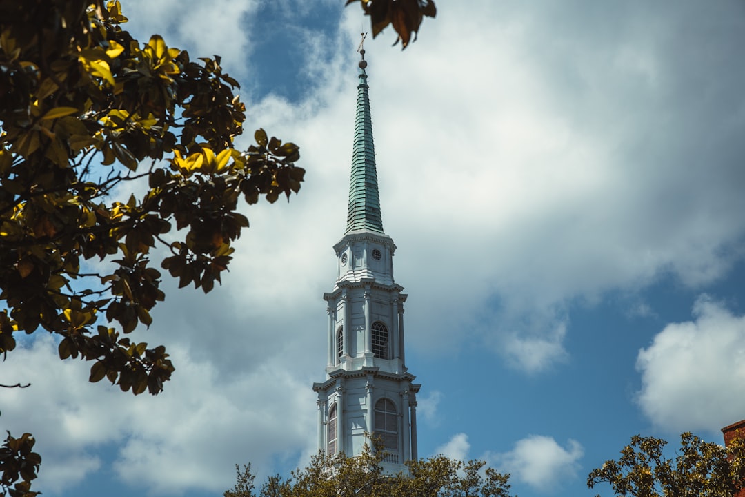 a church steeple with a sky background,