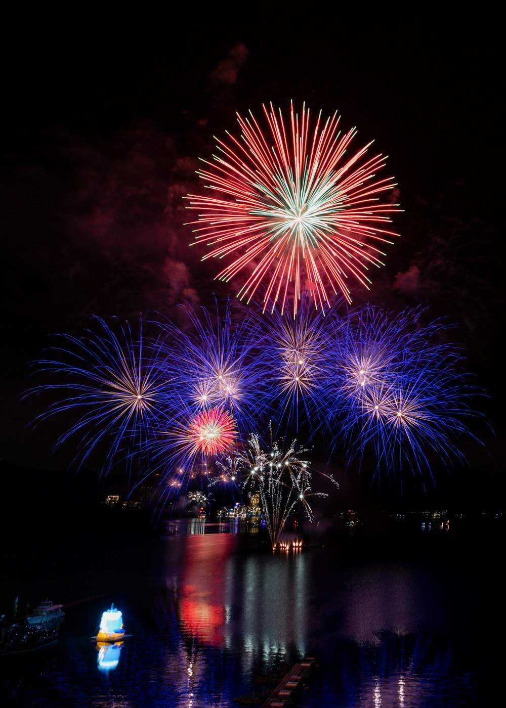 a fireworks display over a body of water