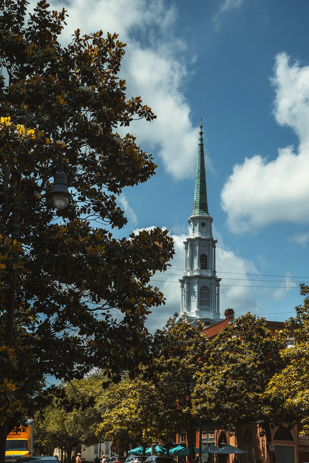 a church steeple with a clock on it