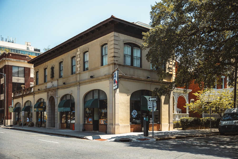 a street corner with a building on the corner