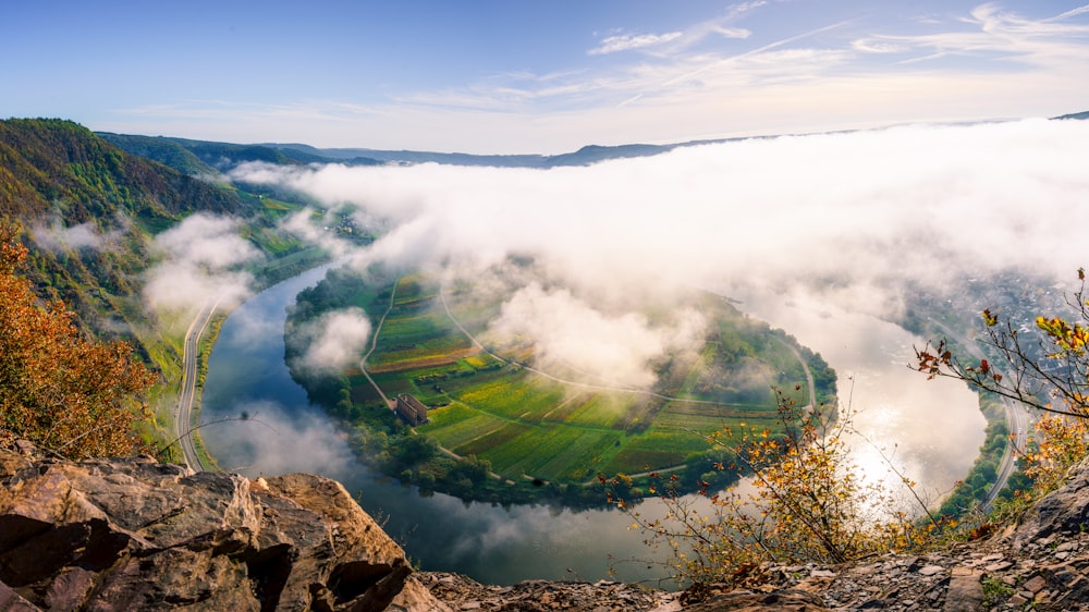 a view of a valley and a river from a cliff