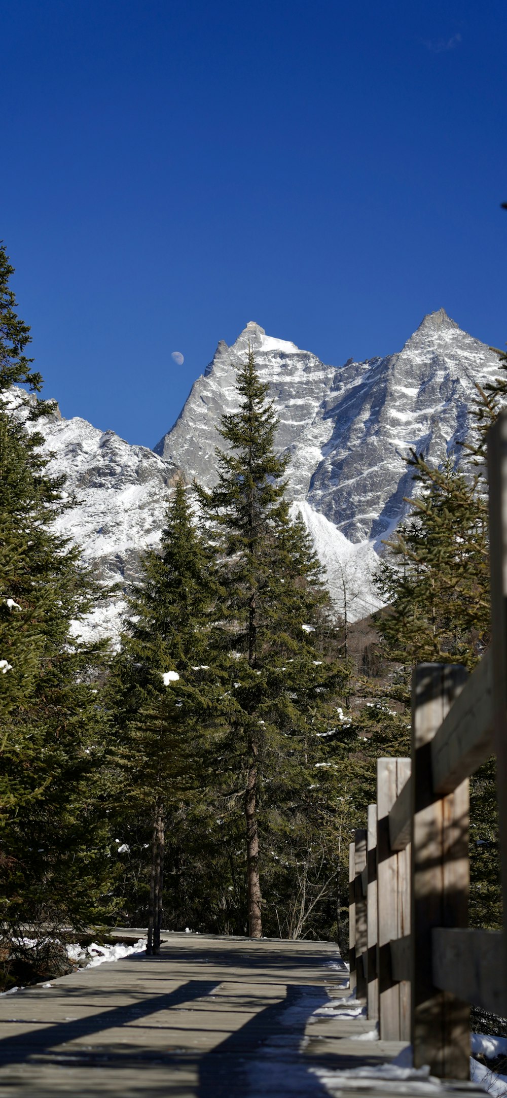 a scenic view of a snowy mountain range