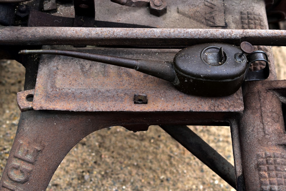 a close up of a rusted metal object