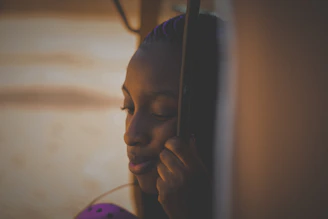 Calm moment of meditation and focus with soft natural light highlighting peaceful expression