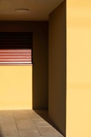 Completed building exterior with fresh paint and clean lines.