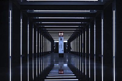 Futuristic hospital corridor with glowing safety indicators highlighting protective zones.