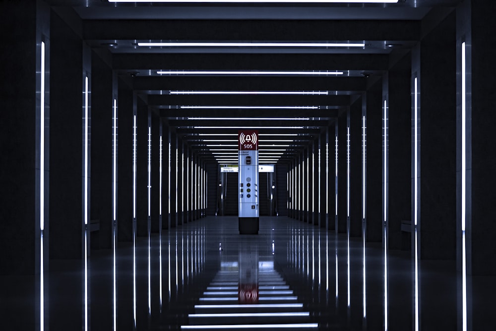 a long hallway with a clock on the wall