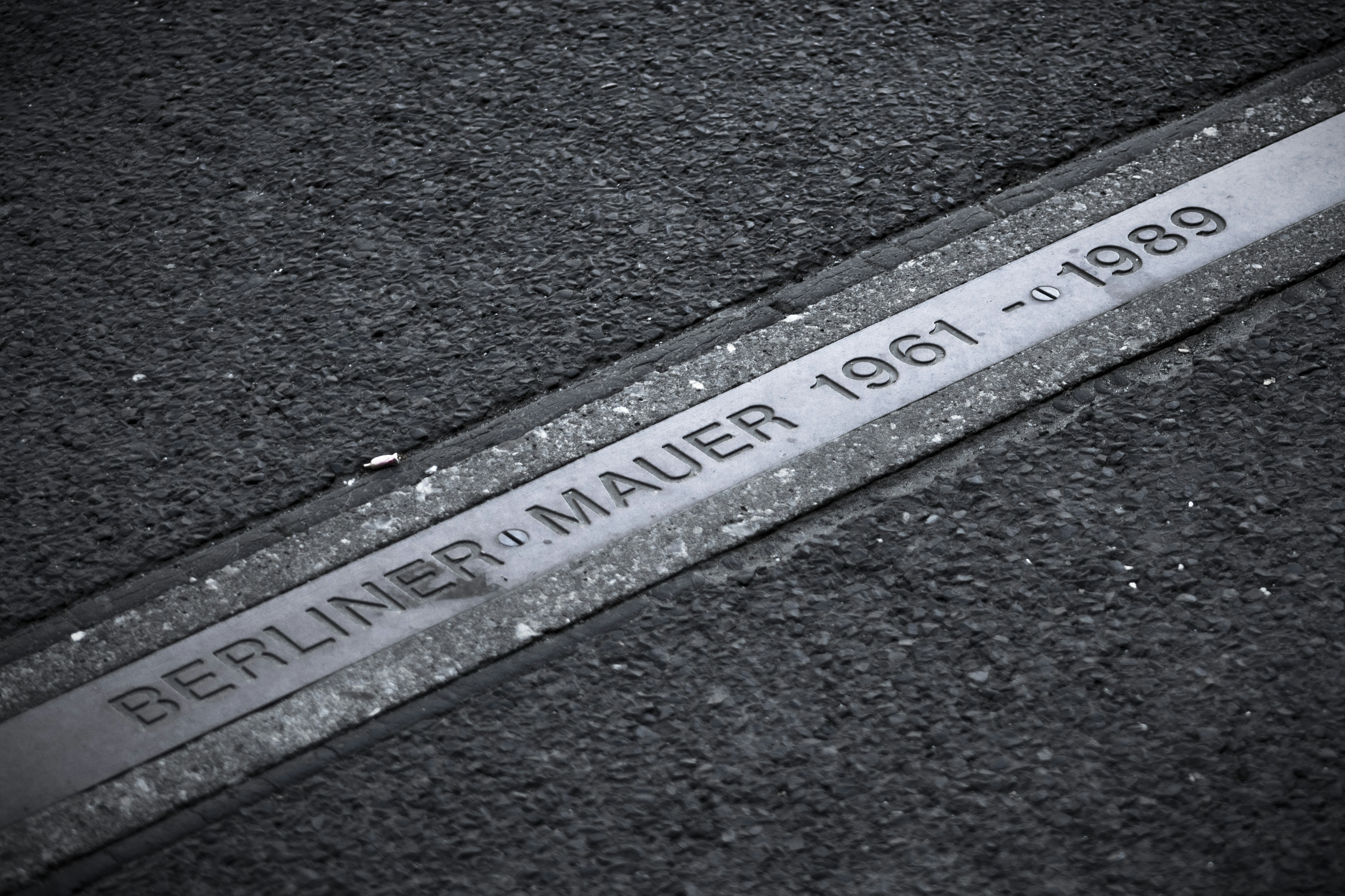 a black and white photo of a street sign