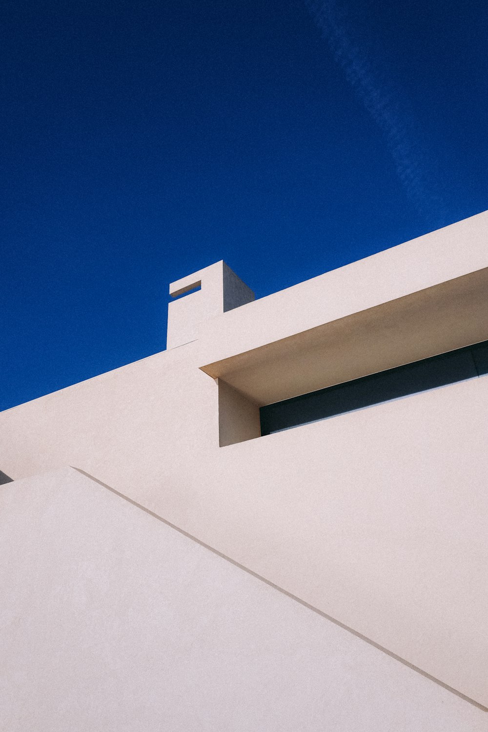 a building with a clock on the side of it