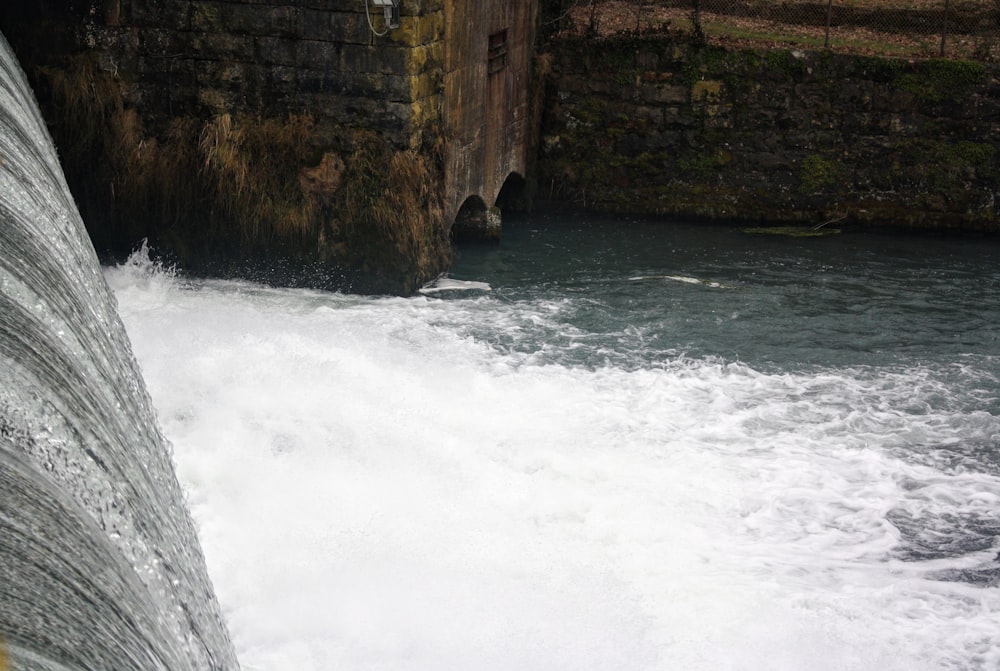 a man riding a boat on top of a river