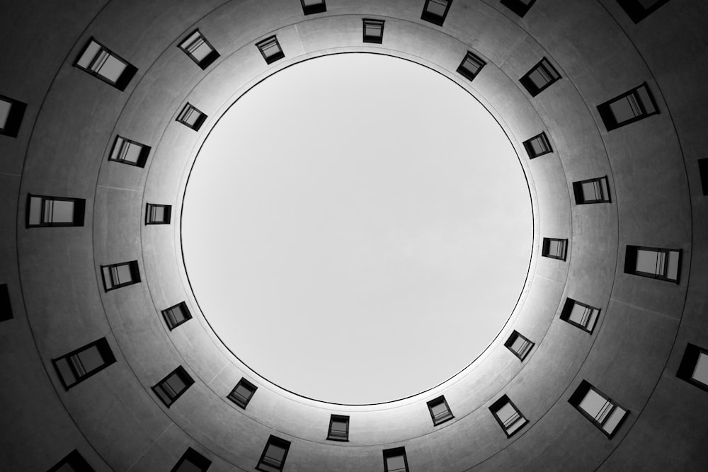 a circular view of a building with a sky in the background