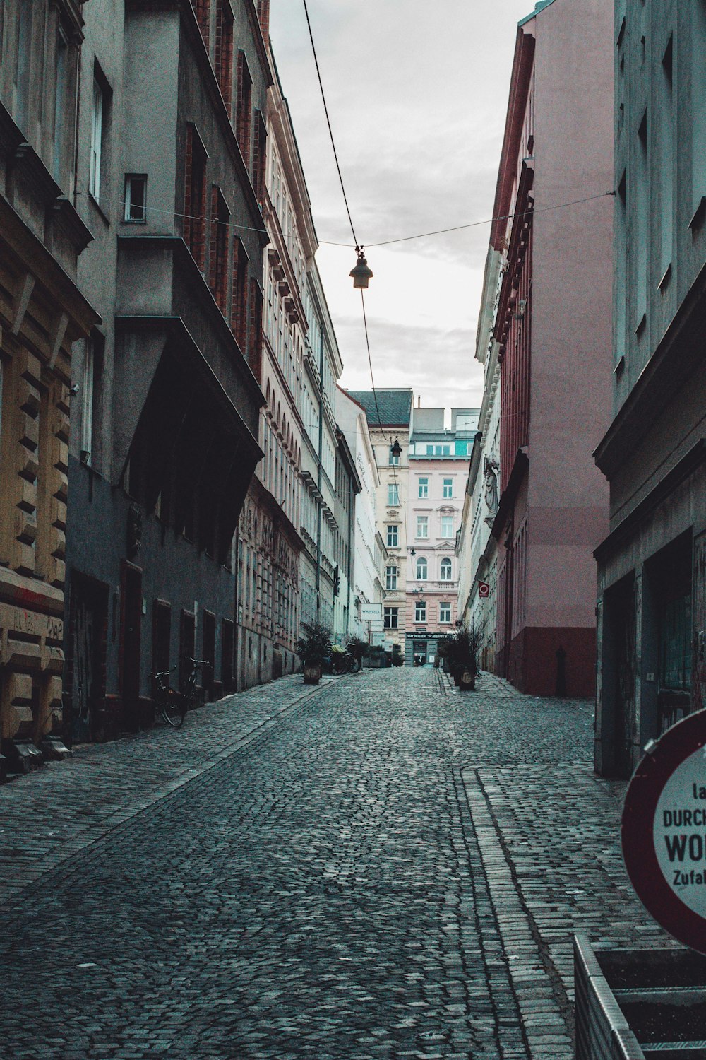 a cobblestone street in a european city