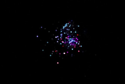 A group of diverse cartoon aliens celebrating with digital tokens under a starry sky.