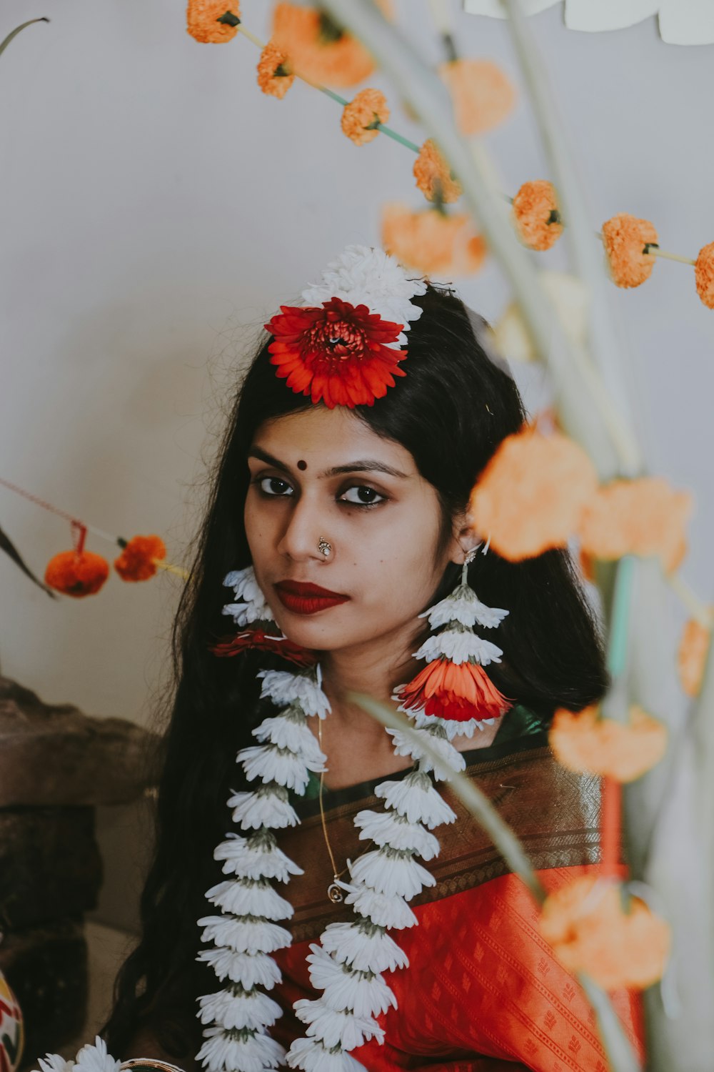 a woman with a flower in her hair