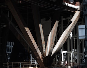 Close-up of robust steel beams forming a construction site background.