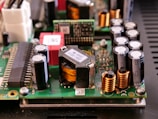 a close up of a circuit board with many electronic components