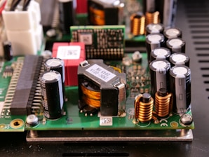 a close up of a circuit board with many electronic components