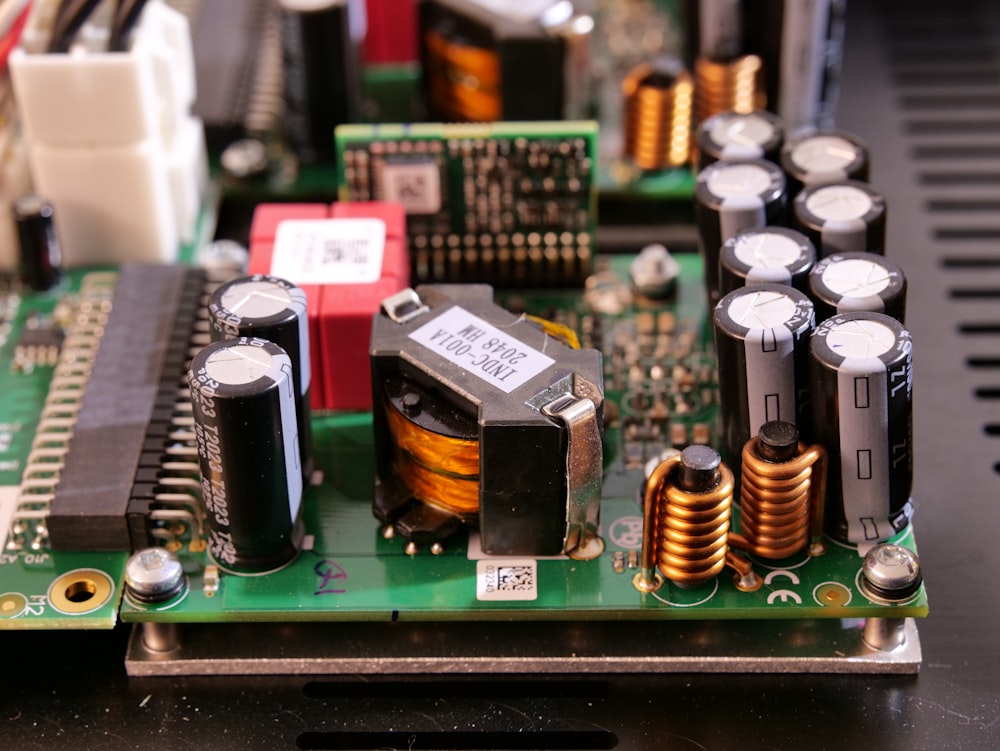 a close up of a circuit board with many electronic components