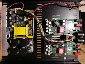 a close up of a computer motherboard with wires
