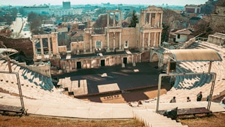 an aerial view of a large building with stairs leading up to it