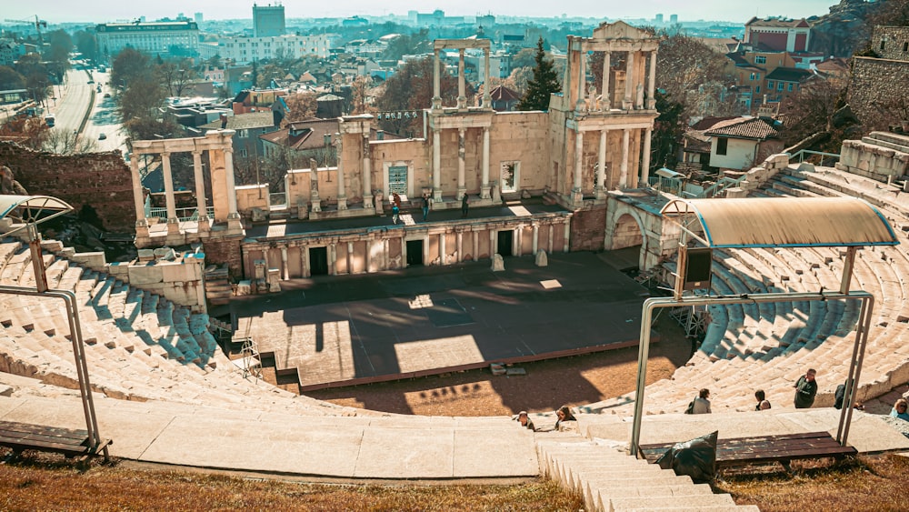 an aerial view of a large building with stairs leading up to it