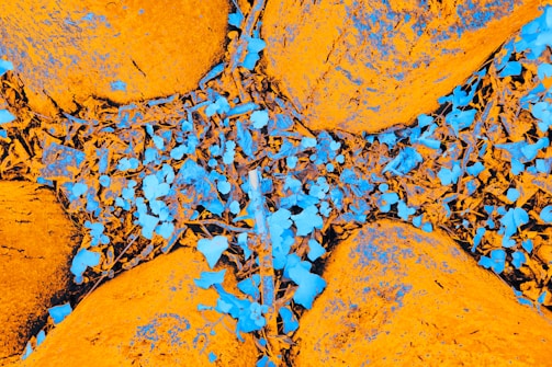 Abstract geometric shapes in blue and orange tones symbolizing stability and growth