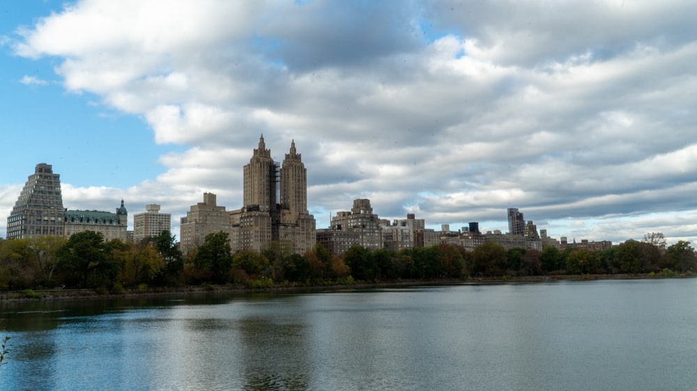 a body of water surrounded by tall buildings