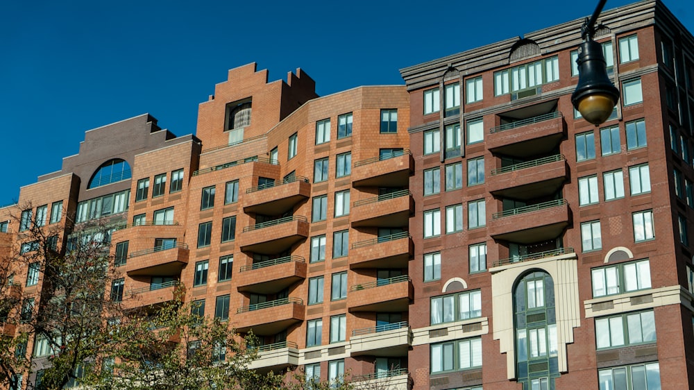 a tall brick building with lots of windows