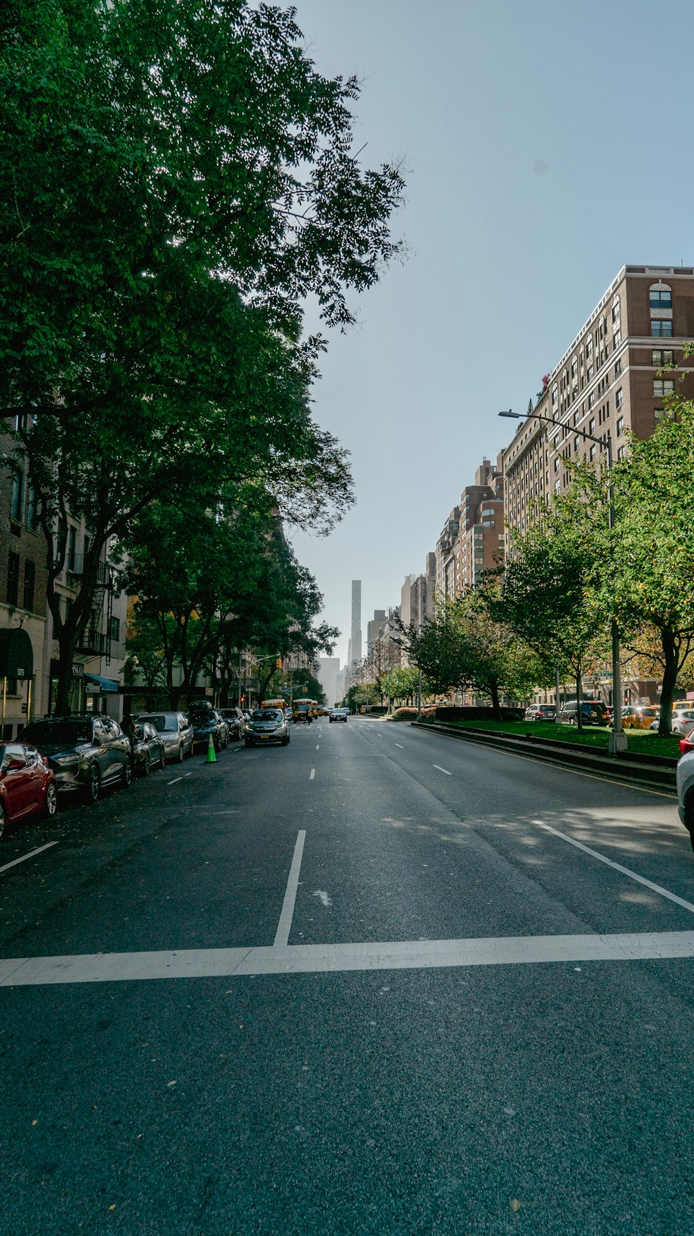 a street with cars parked on both sides of it