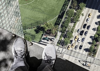 a person standing on top of a tall building