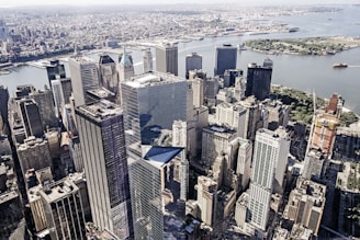 an aerial view of a city with tall buildings