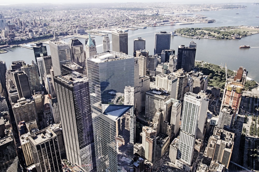 an aerial view of a city with tall buildings