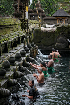 a group of people in a body of water