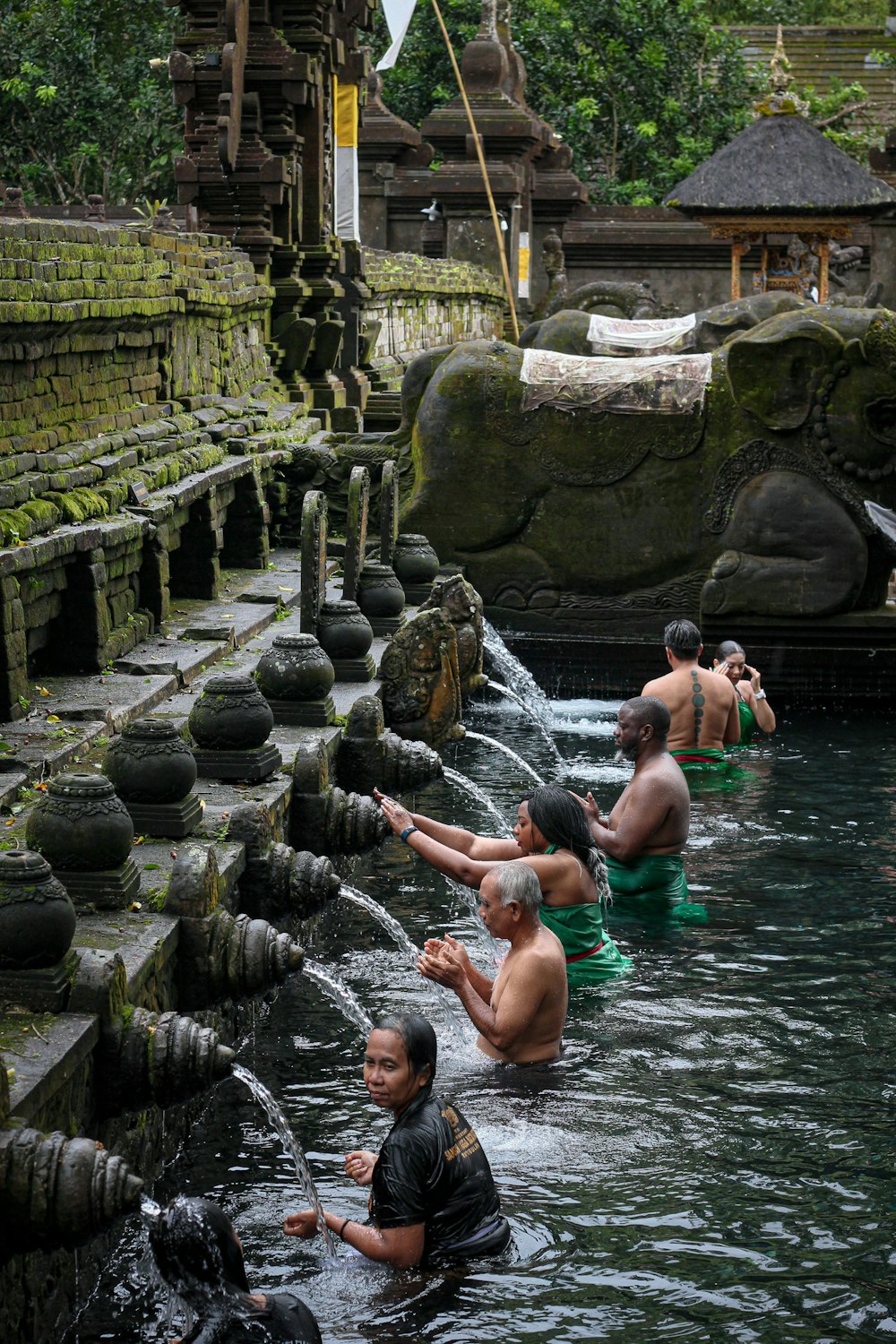 a group of people in a body of water