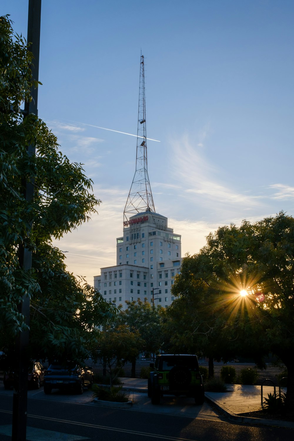 a very tall building with a very tall antenna on top of it