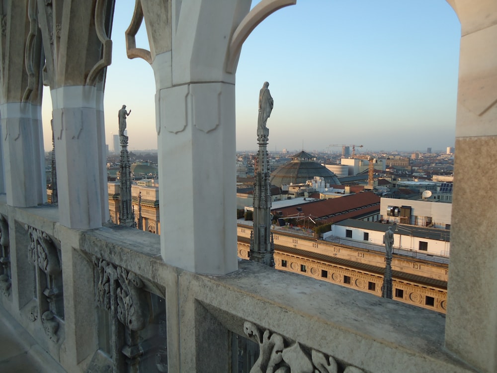 a view of a city from a balcony of a building