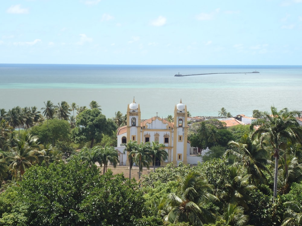 a church in the middle of a tropical area