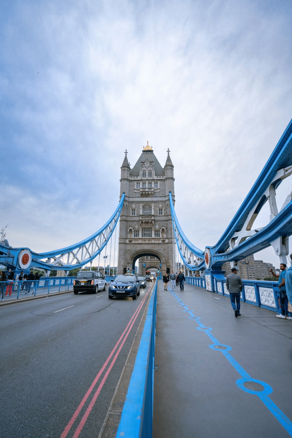 a view of a bridge with cars driving on it