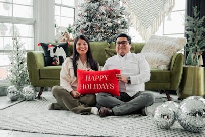 A vibrant holiday area rug laid out in a festive living room setting.