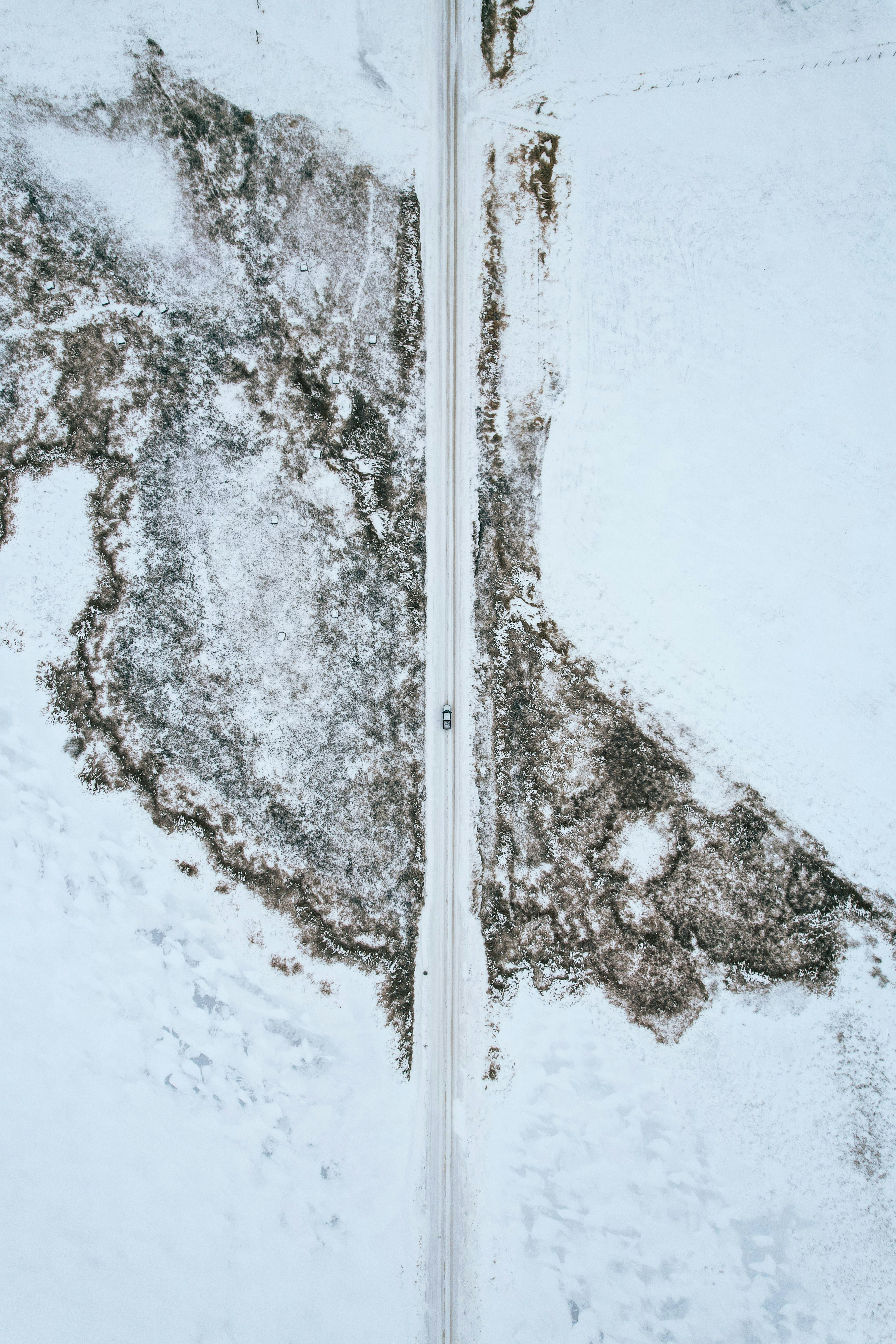 a view of a snow covered road from above