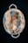 A baby is sleeping in a white wicker basket, wrapped in a soft blanket. The baby is wearing a knitted hat with bear ears, matching booties, and a diaper. There is also a small knitted bear beside the baby.