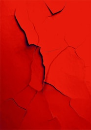 a red wall with a crack in it