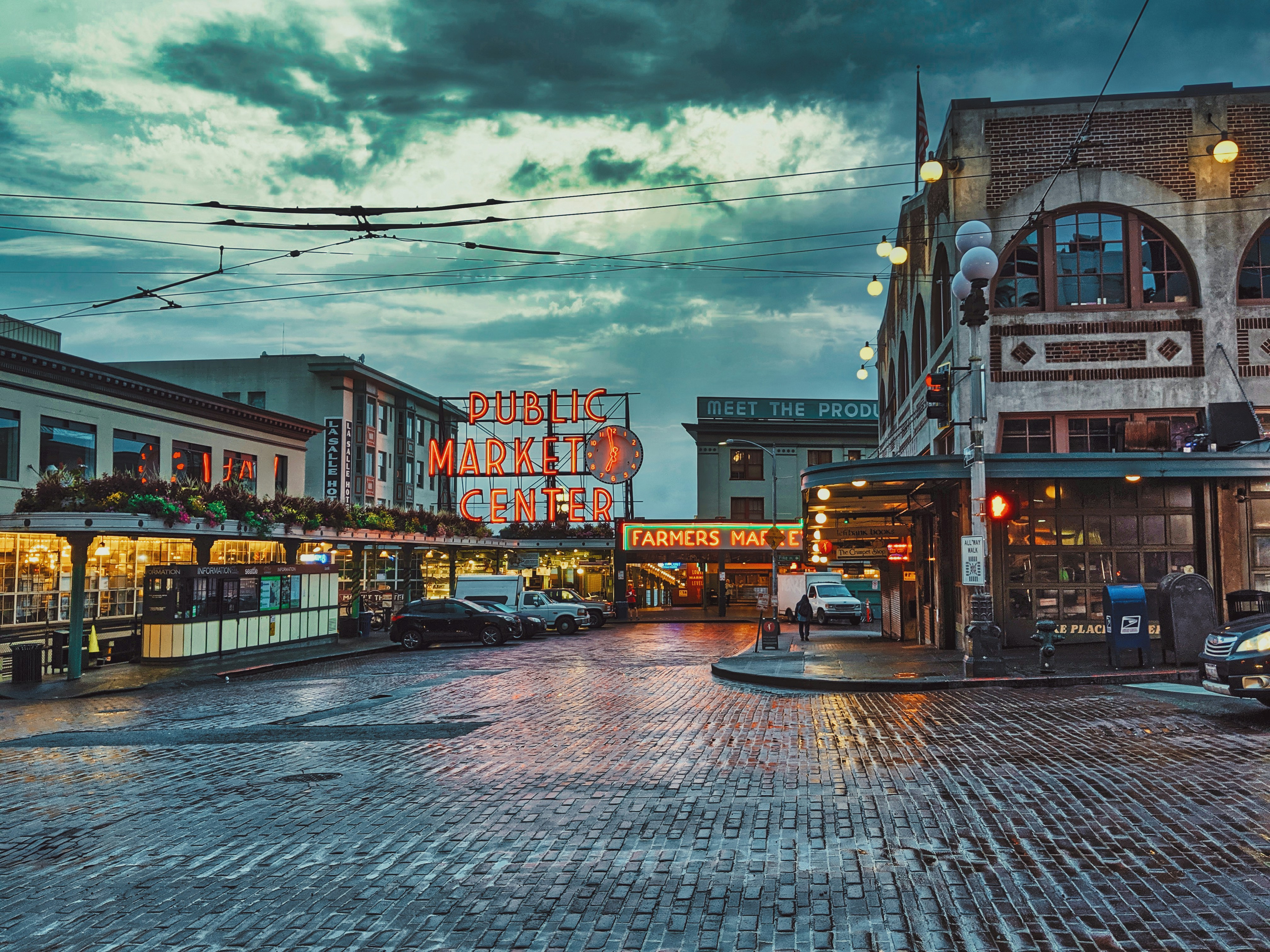 a city street with cars parked on the side of it