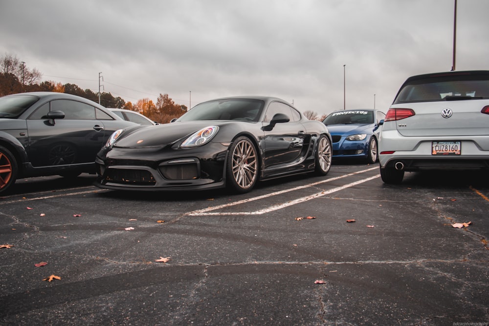 a group of cars parked in a parking lot